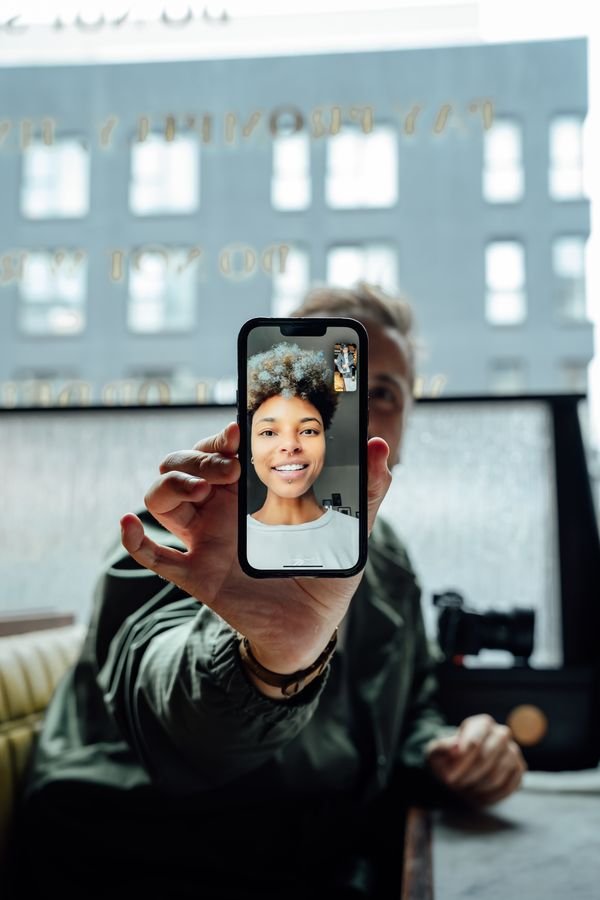 Person in a video call on a mobile phone